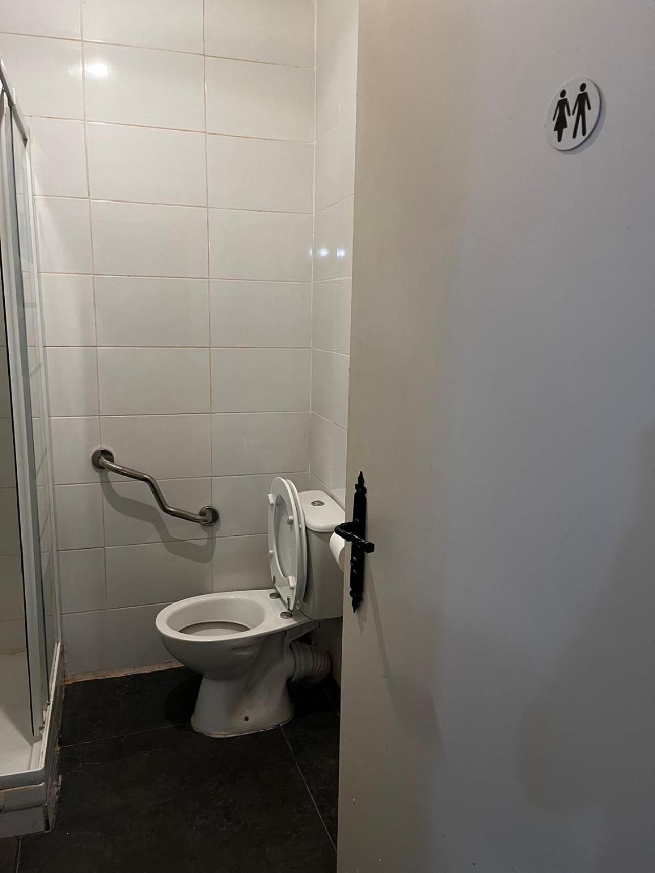 Single Room Shared Shower Toilet